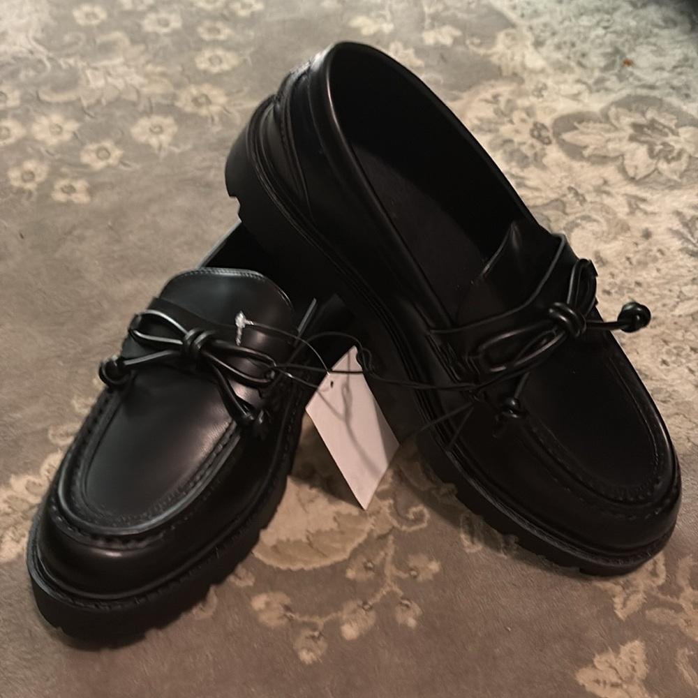 Black loafers